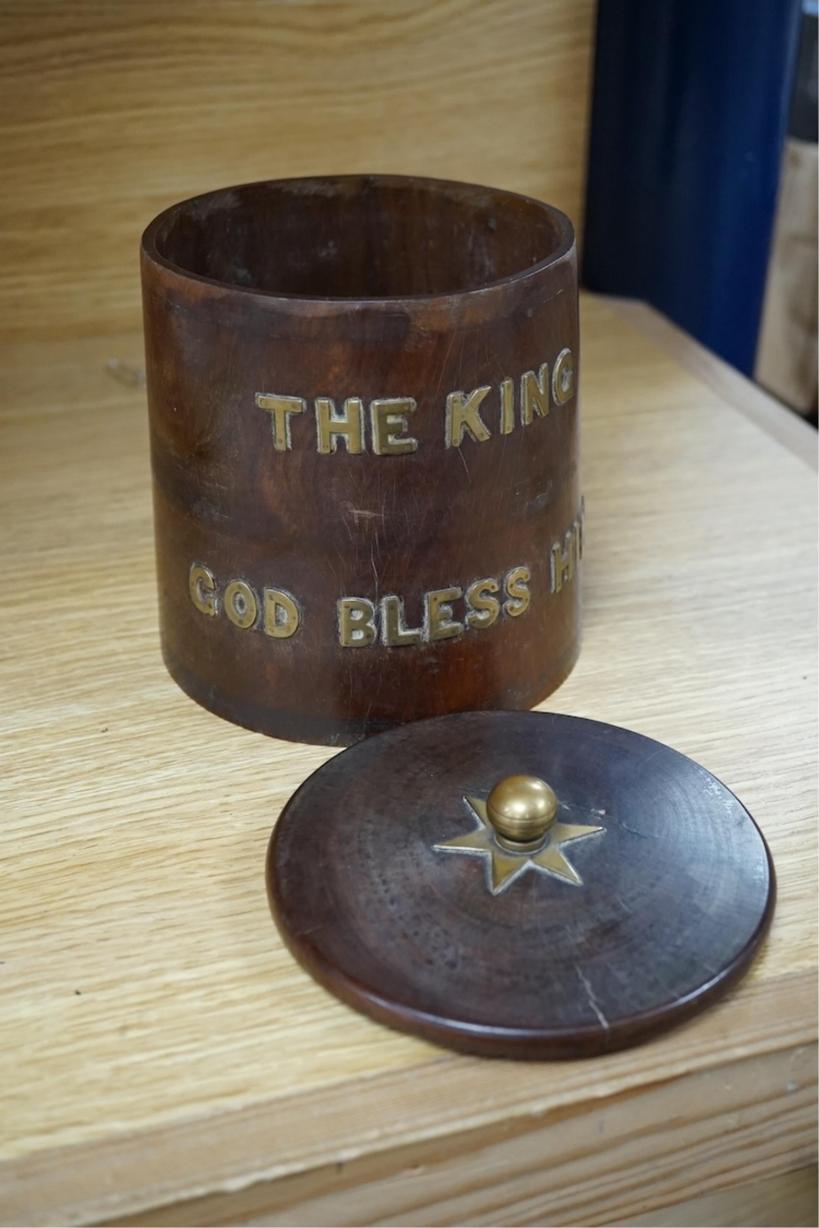 A 19th century turned lignum vitae biscuit barrel with applied brass letters; ‘The King God Bless Him’, 15cm